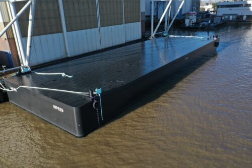 Bontoon barge docked at a pier